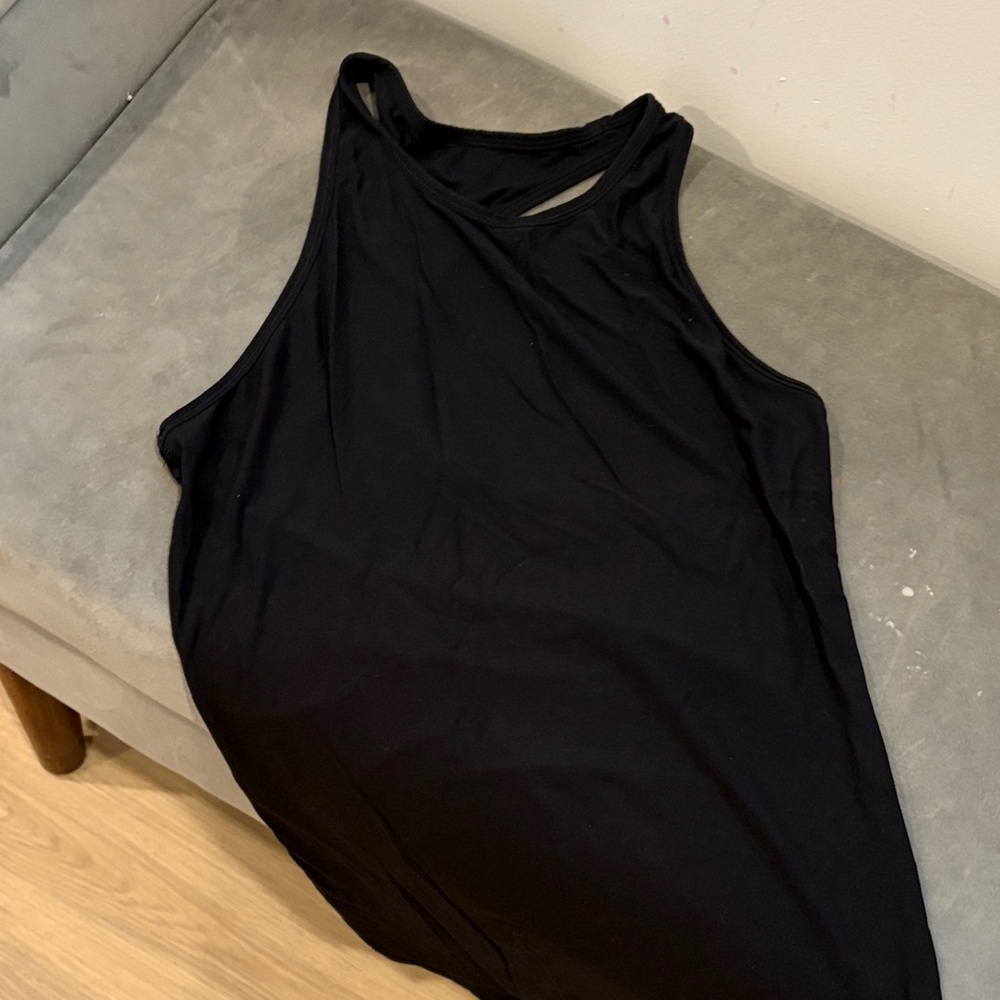 Black Sleeveless Tank Top Lululemon size 6. Asymmetrical crb. High neck